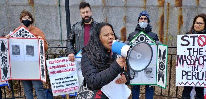 Lucy Pagoada-Quesada habla en la protesta de solidaridad con Perú. Fotos SLL: Stephen Millies