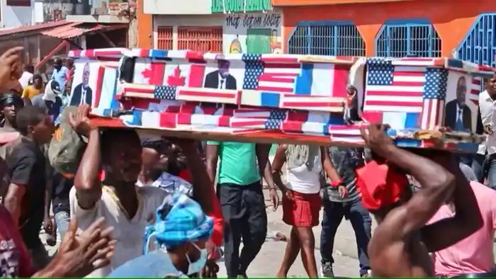 Foto manifestación contra las masacres en Haiti de EEUU