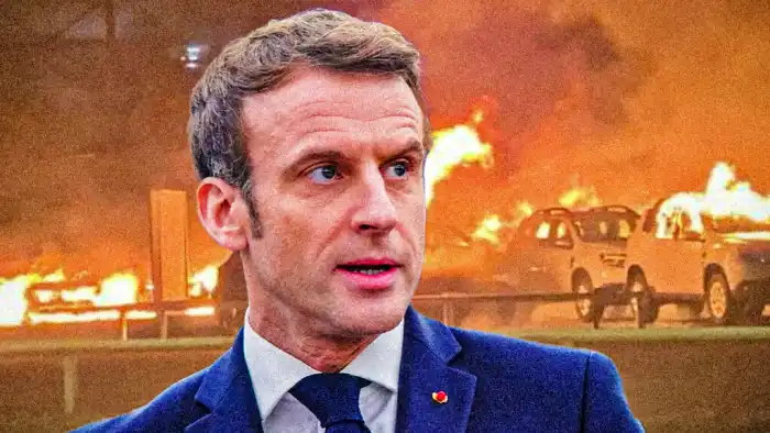 Composición de Macron sobre fondo de llamas de Nueva Caledonia